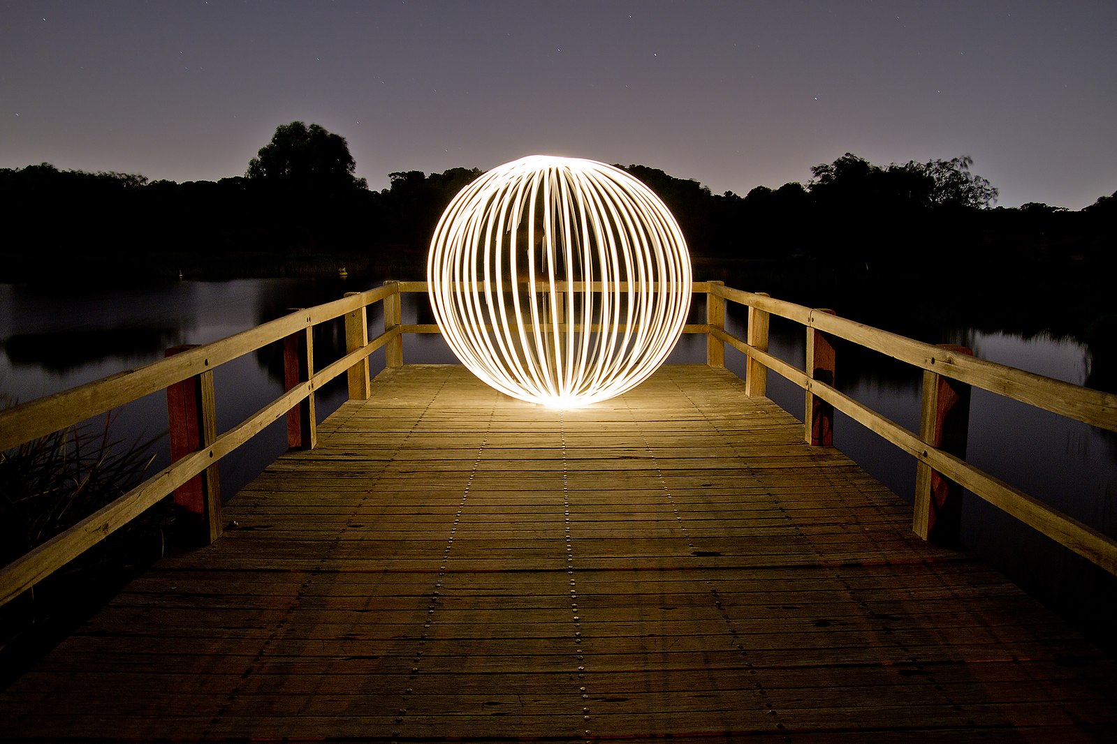 JJ Harrison. Light painting an orb in Booyeembara Park, Perth, Western Australia, Australia.