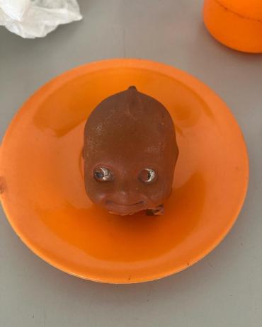 Sample plastic object - dolls head on dish