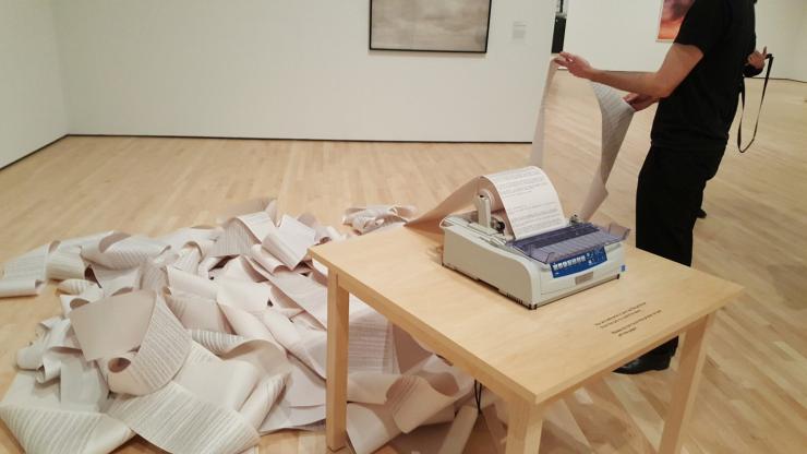 Hans Haacke, News, 1969/2008. Newsfeed, paper, and printer. Installation view, SFMOMA, 2018. Photo: Dušan Barok.