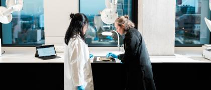 Libby Ireland and a MSc student discuss the degredation of a plastic object. Photograph James Tye