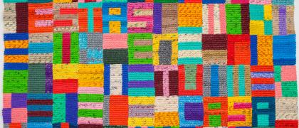 Antonia Pérez, "Estas en tu Casa," 2015, crocheted plastic bags, 64" x 108" Image of a colorful geometric quilted pattern, made from crocheted plastic bags.