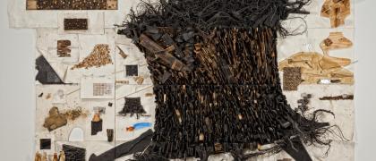 Collage of paper, wood, and found objects, creating an image of a large burnt tree stump, among similar motifs..