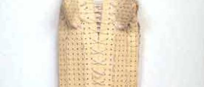 Mimi Smith, "Girdle," 1966, rubber bath mats, elastic, ribbon, 58 x18 x8 inches. Photo of a woman's girdle made out of rubber bath mats, elastic, and ribbons.